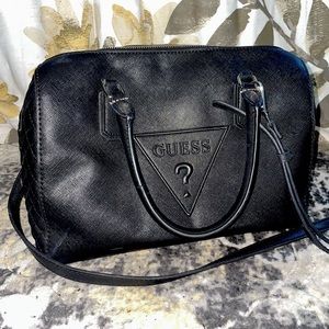 Used Guess handbag/over the shoulder. Black with silver accents.